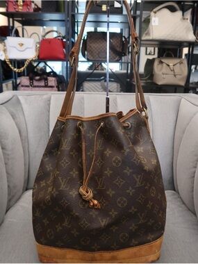 Louis Vuitton Monogram Drawstring Hobo Bag in Brown